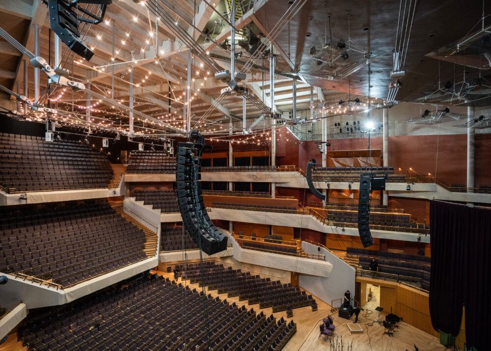 Concert hall with line arrays hung.